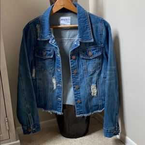 Barely worn distressed denim jacket.